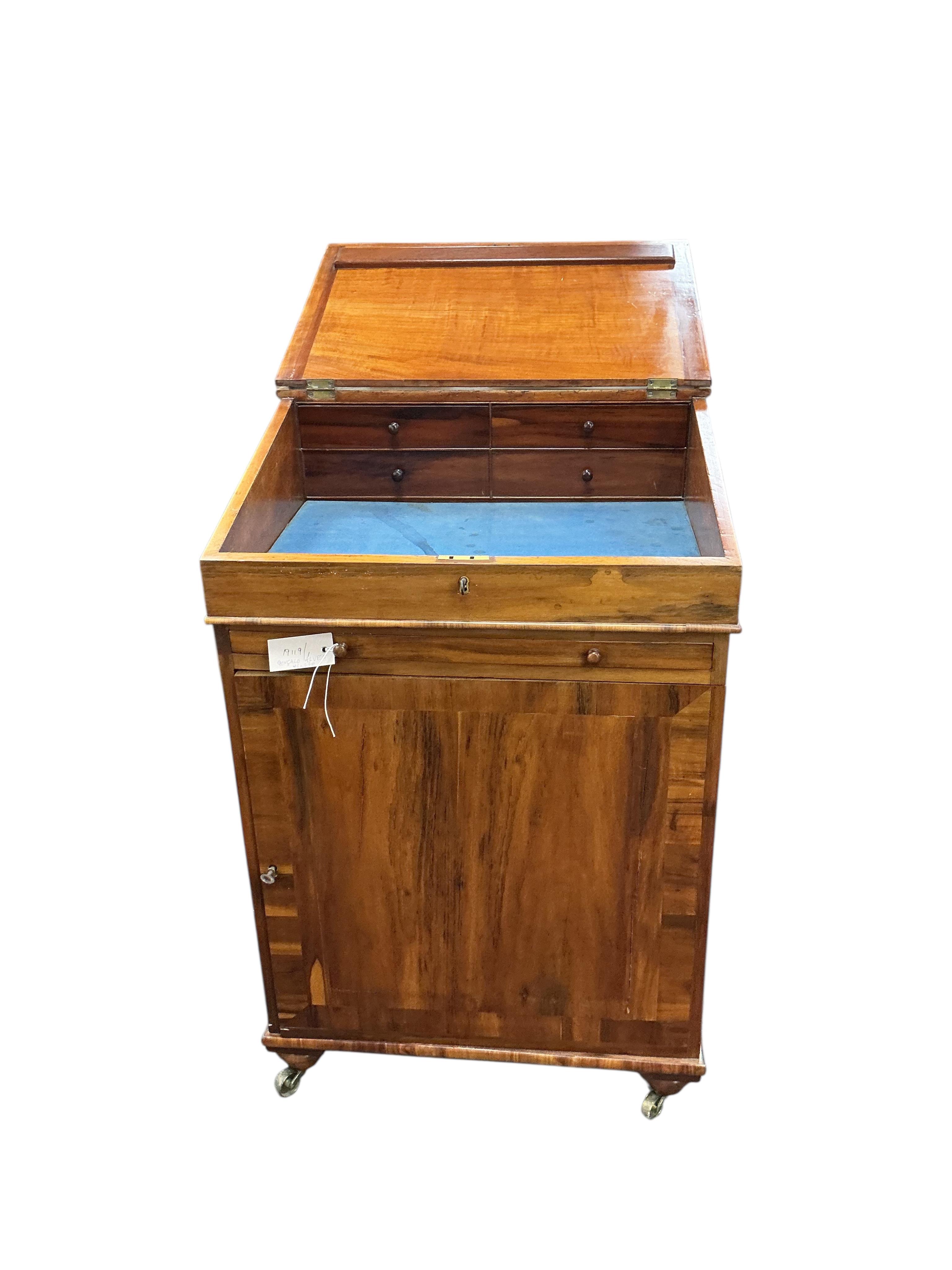 A 19th century Gonzalo Alves Davenport, width 57cm, depth 57cm, height 89cm